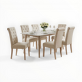 Dining table set with beige chairs on a white background