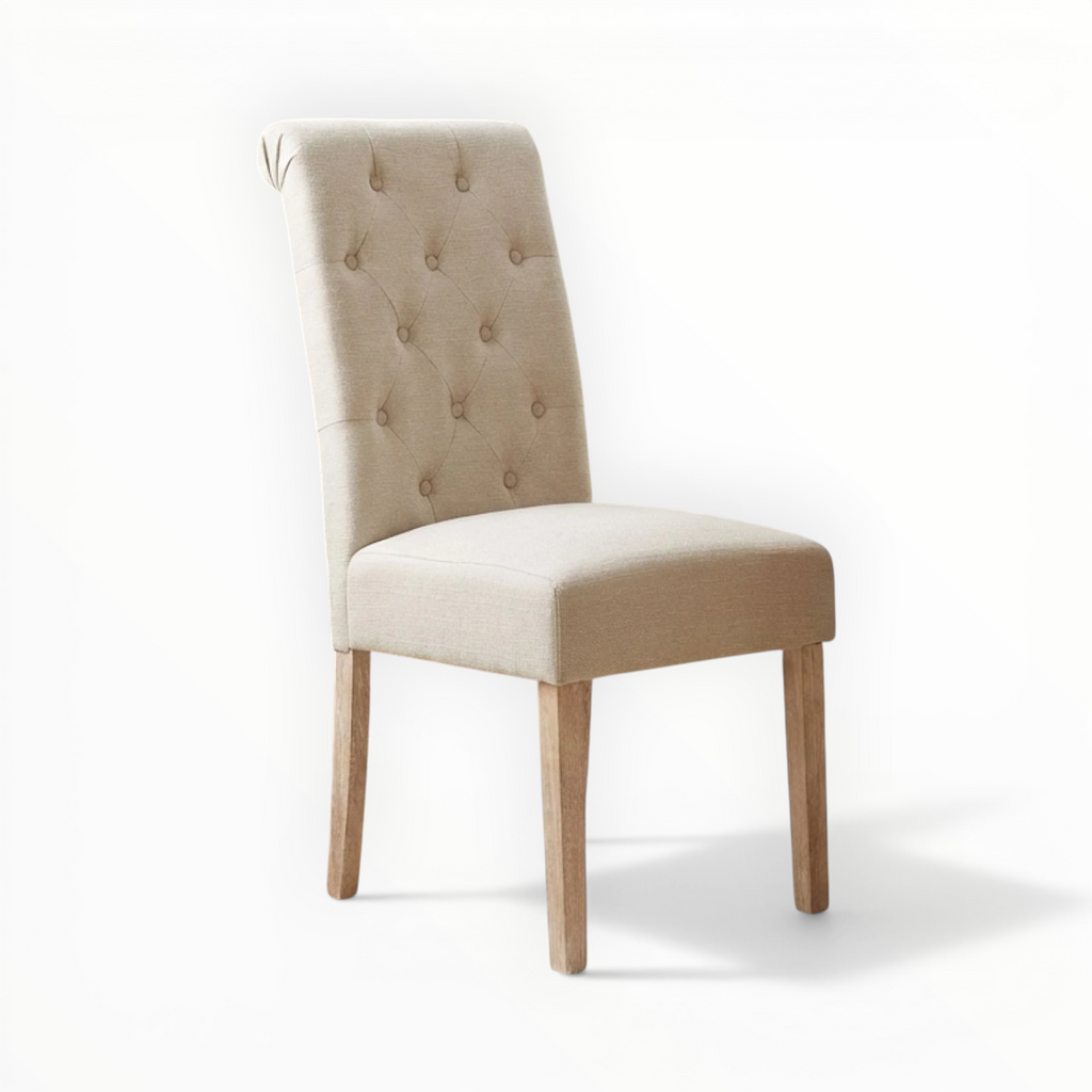 Beige upholstered chair with wooden legs on a white background