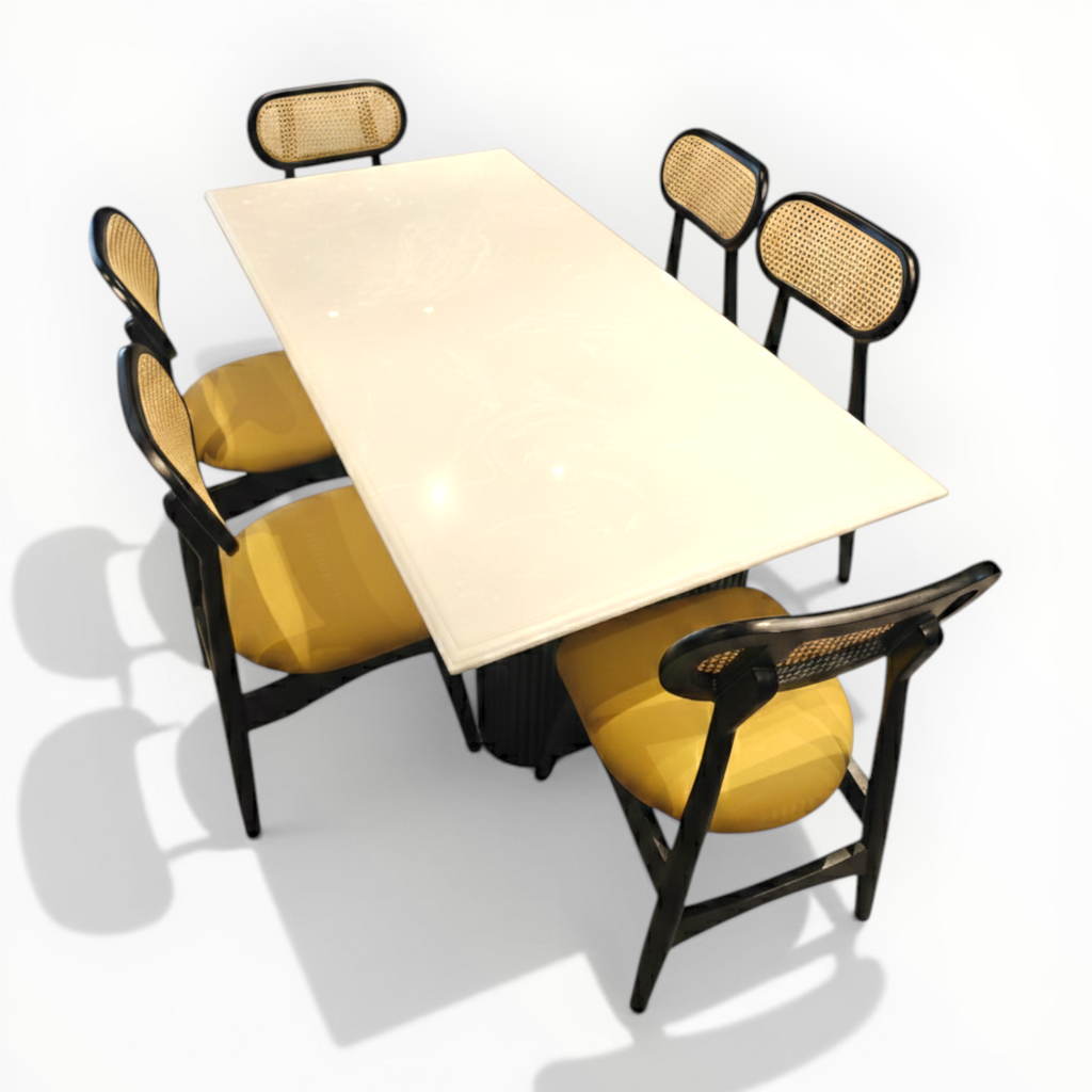 Table with four chairs on a white background