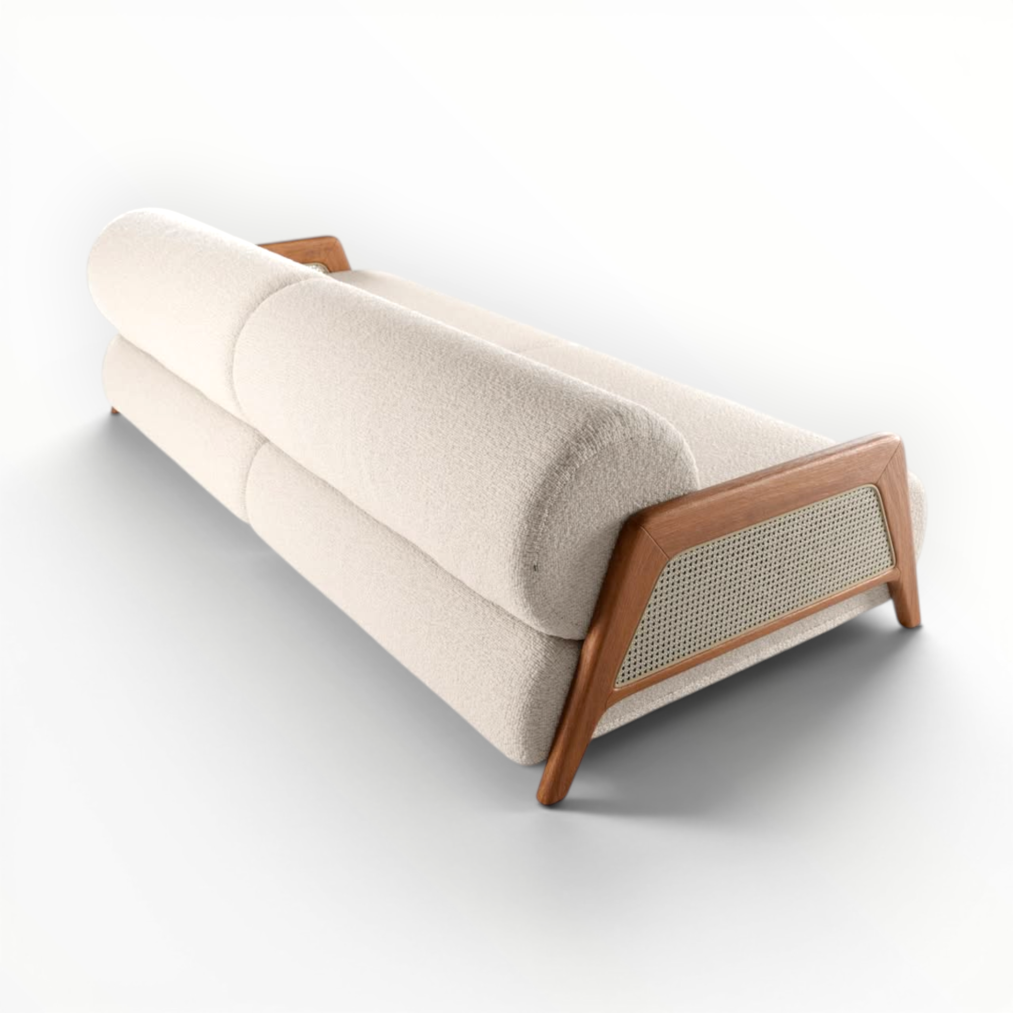 Modern sofa with wooden frame and wicker backrest on a white background