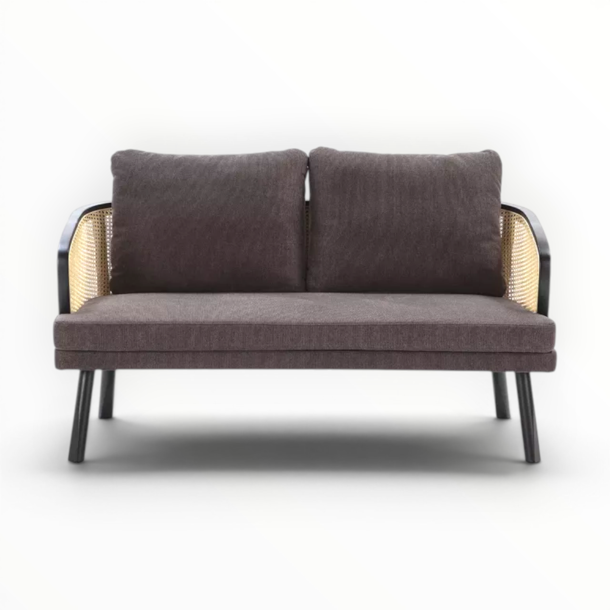 Brown sofa with wicker armrests on a white background