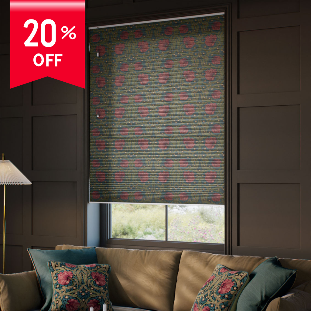 Patterned roller blind in a room with a sofa and decorative pillows, featuring a 20% off banner.