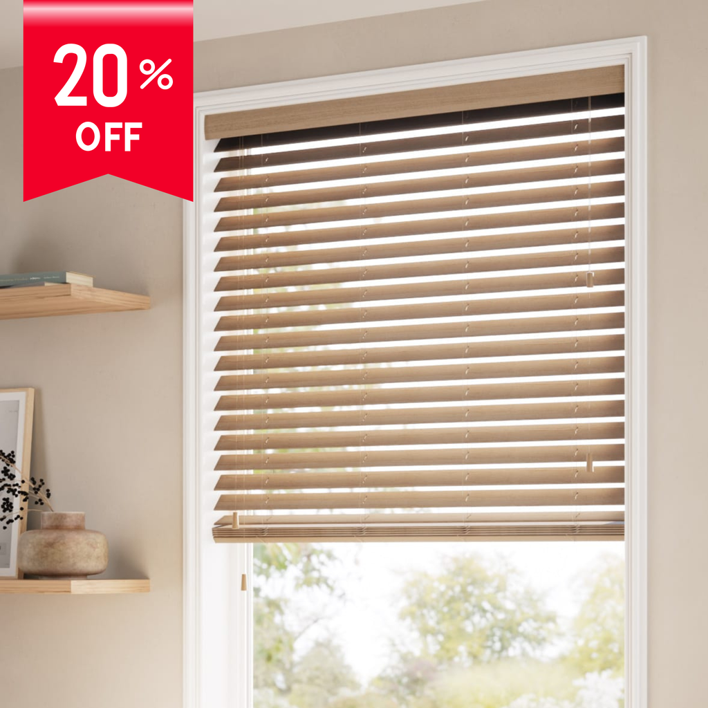 Window with wooden blinds and a 20% off discount banner on a beige wall.
