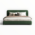 Jade Bouclé Upholstered Platform Bed close-up showing soft rounded corners and forest green bouclé fabric — Woodkraft Studio Hyderabad