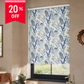 Roller blind with leaf pattern in a room with a 20% off label.