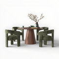 Dining table with four green chairs on a white background