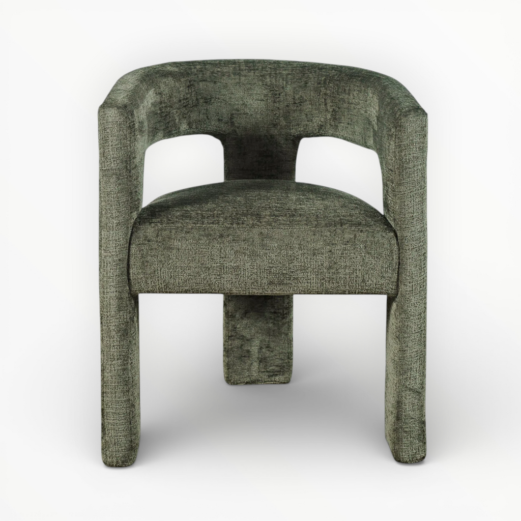 Green upholstered chair on a white background