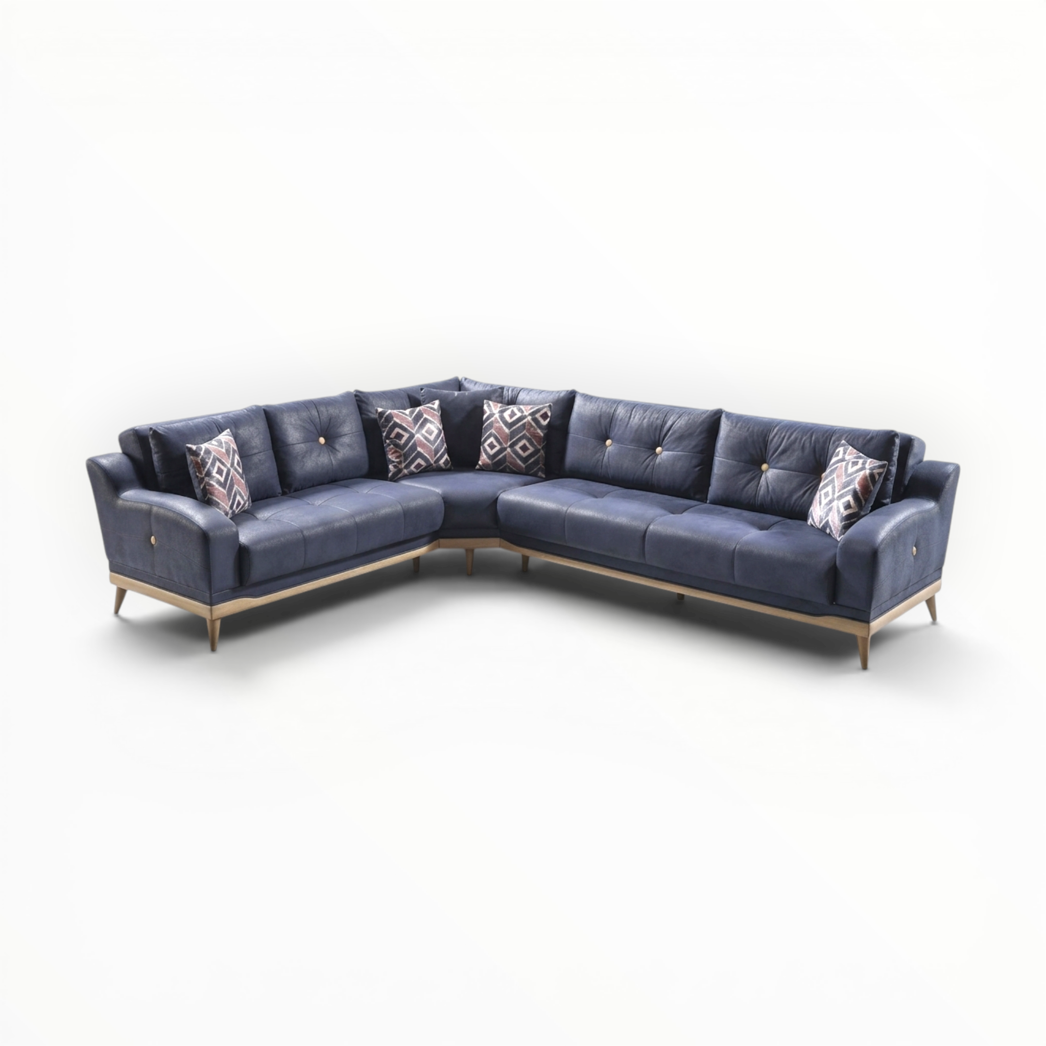 Blue sectional sofa with patterned cushions on a white background