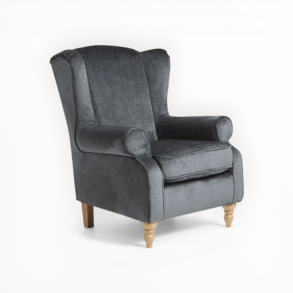 Gray armchair with wooden legs on a white background