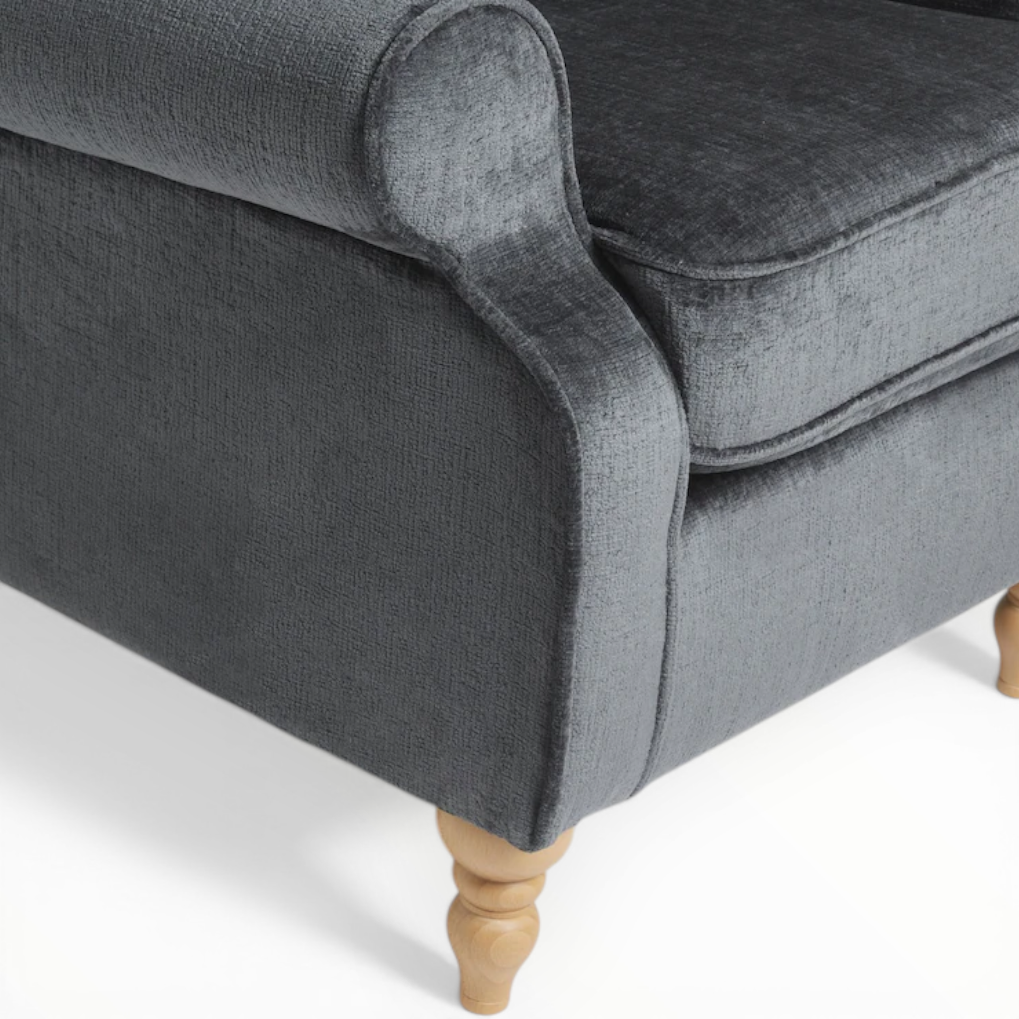 Gray upholstered chair with wooden legs on a white background