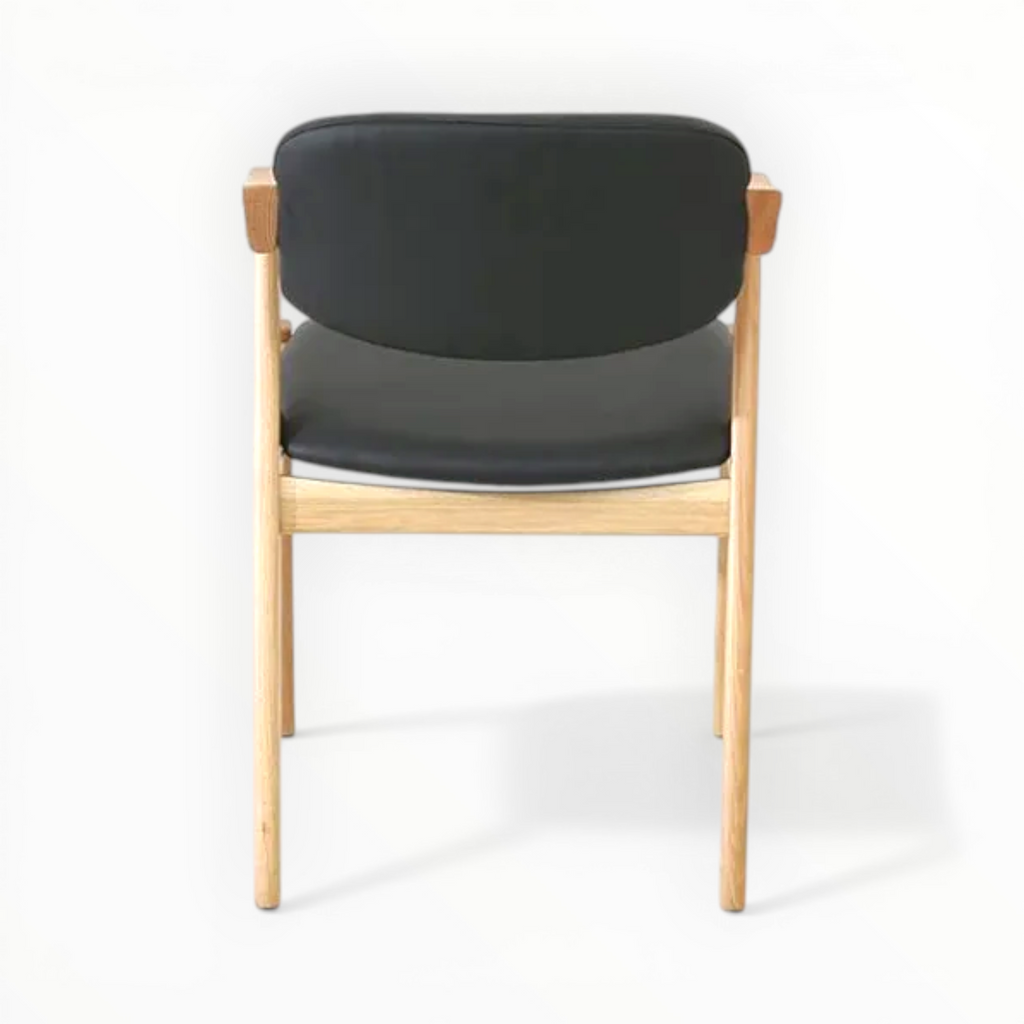 Chair with black seat and backrest on a white background