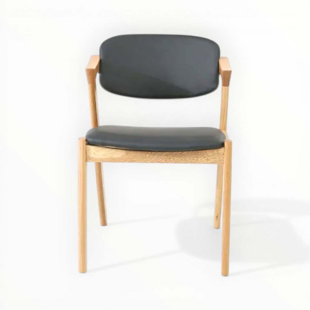 Chair with black seat and backrest on a white background