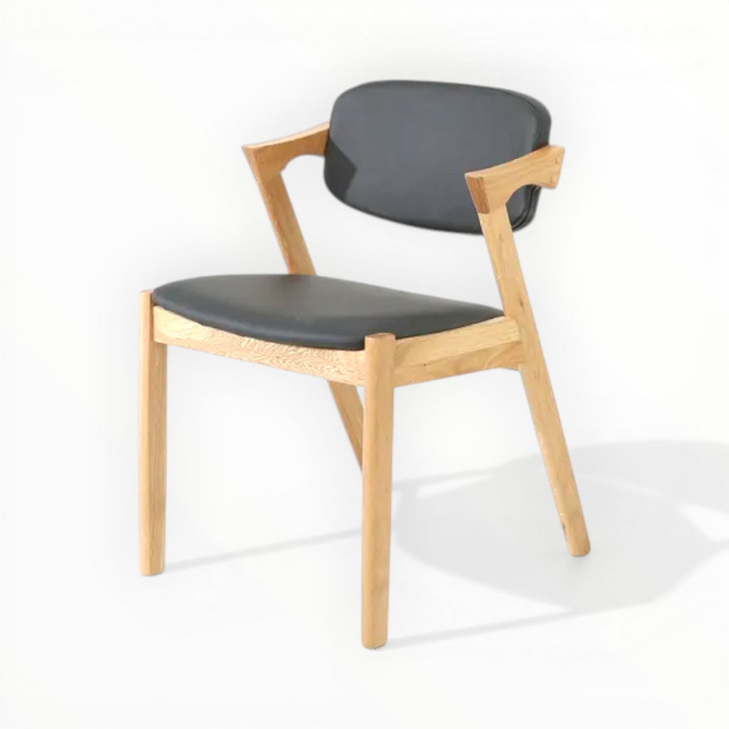 Chair with black seat and backrest on a white background