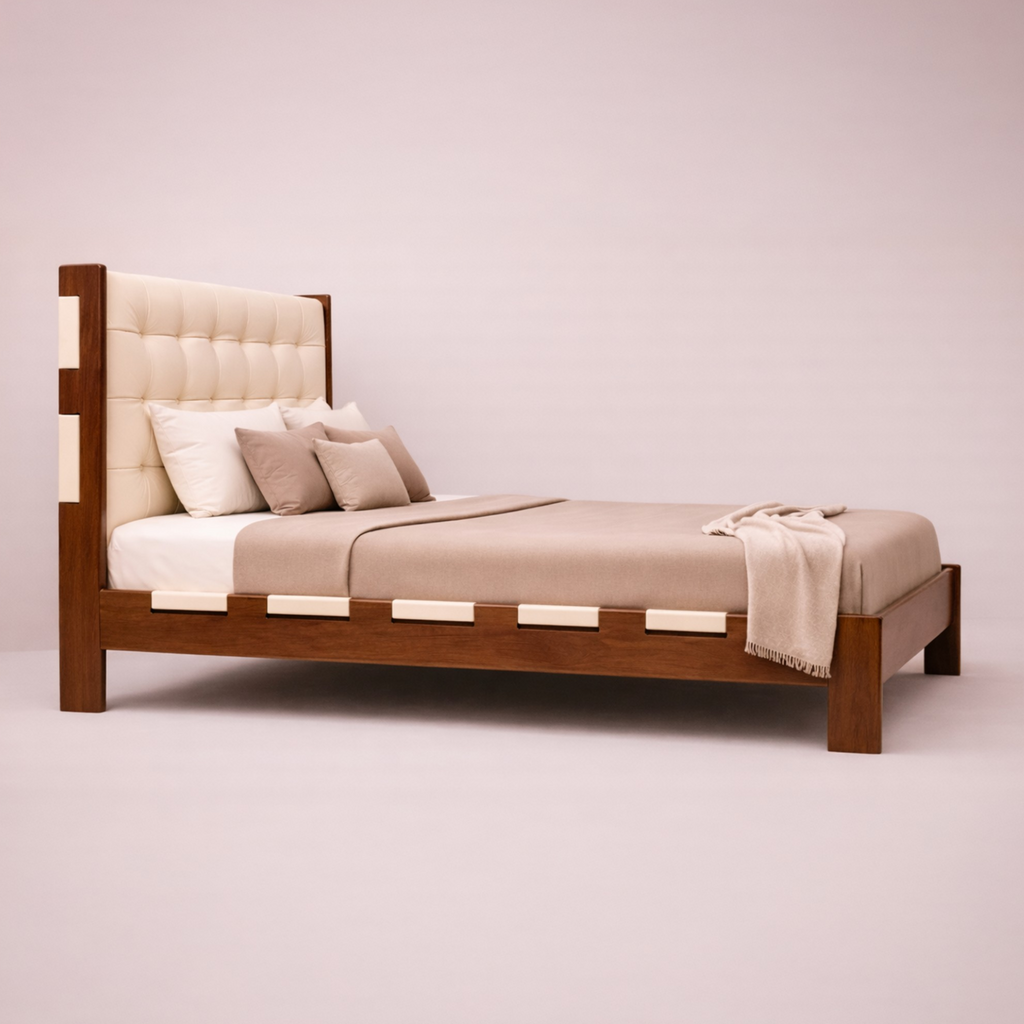 Wooden bed with beige bedding on a plain background