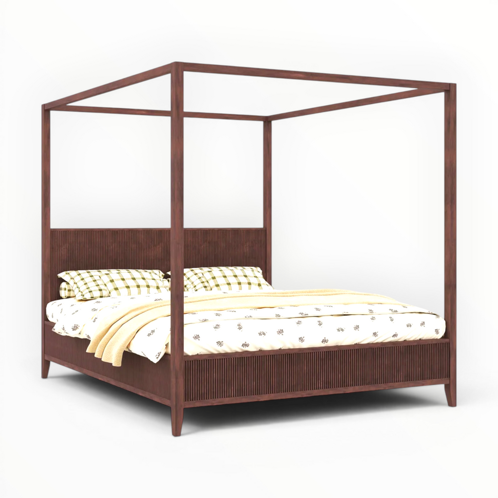 Wooden canopy bed with bedding on a white background