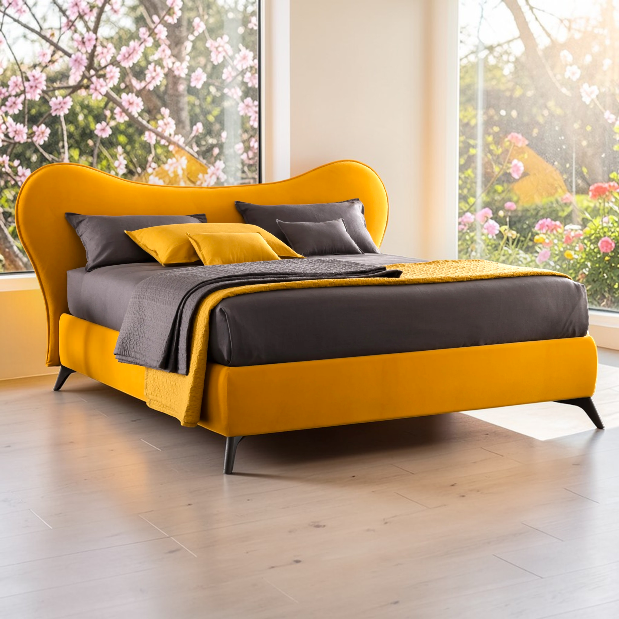 Modern yellow and gray bed in a bright room with floral decorations