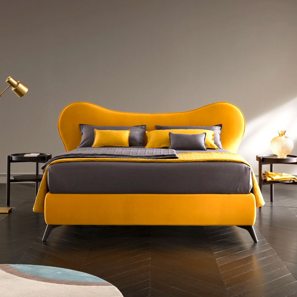Modern bedroom with a yellow and gray bed