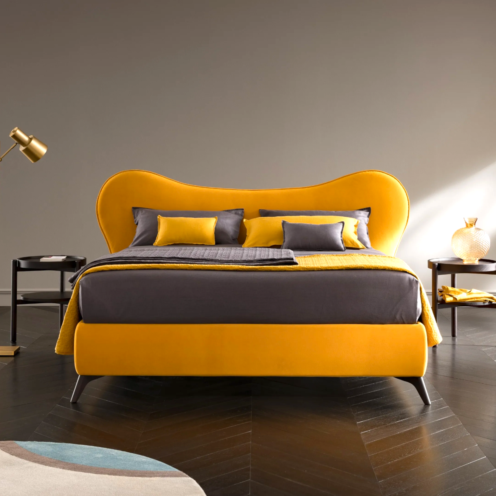 Modern bedroom with a yellow and gray bed