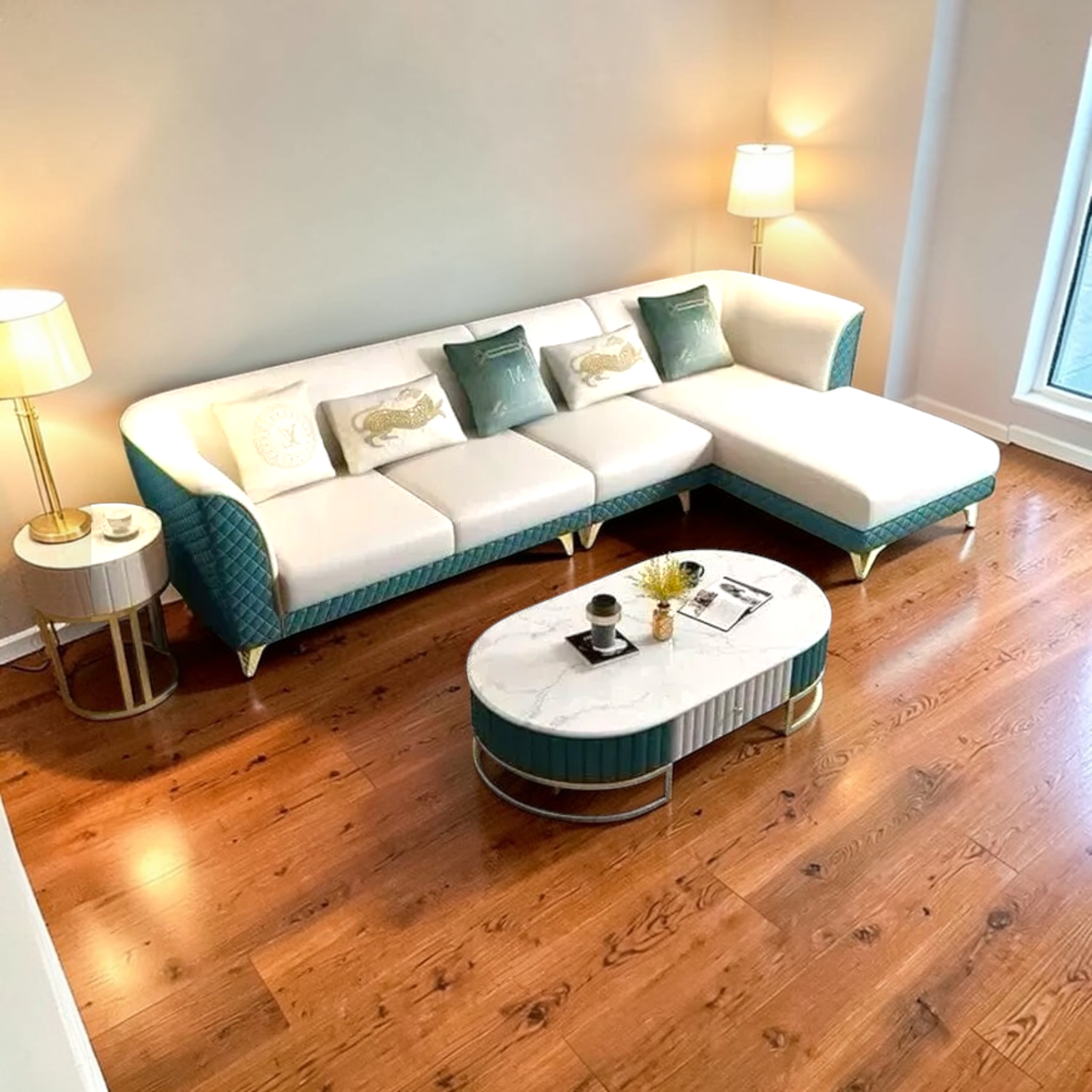 Modern living room with a sectional sofa, coffee table, and decorative items.