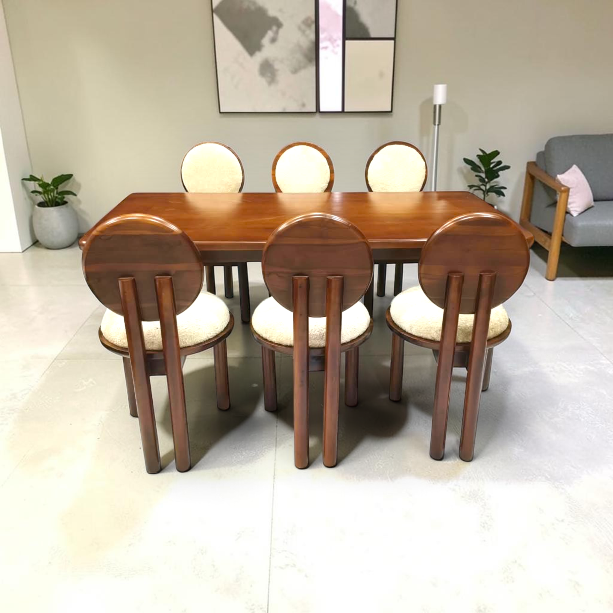 Moon dining table set aerial view showing 6 oval-back teakwood chairs around a 6x3 ft pinewood dining table, Woodkraft Studio Hyderabad
