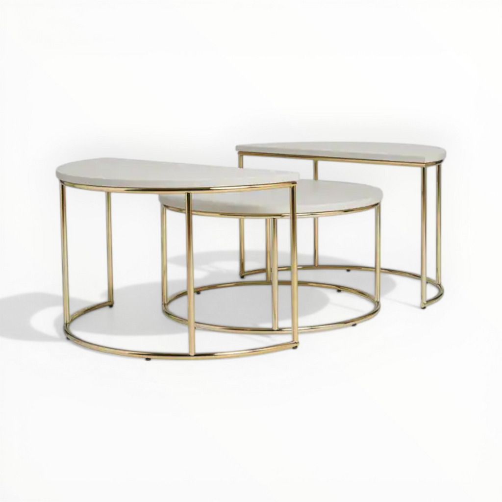 Set of three marble top tables with gold metal frames on a white background