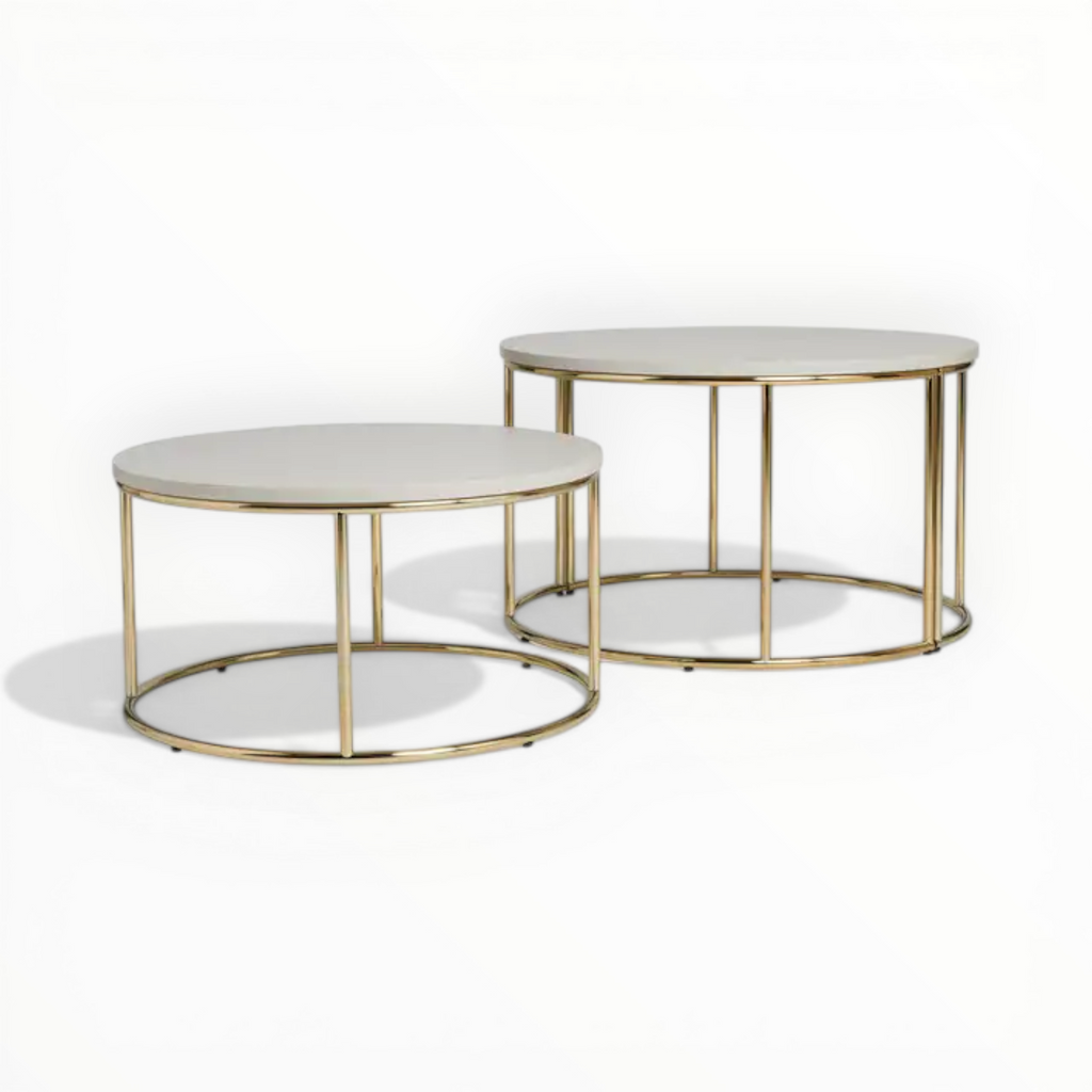 Two round coffee tables with gold frames on a white background