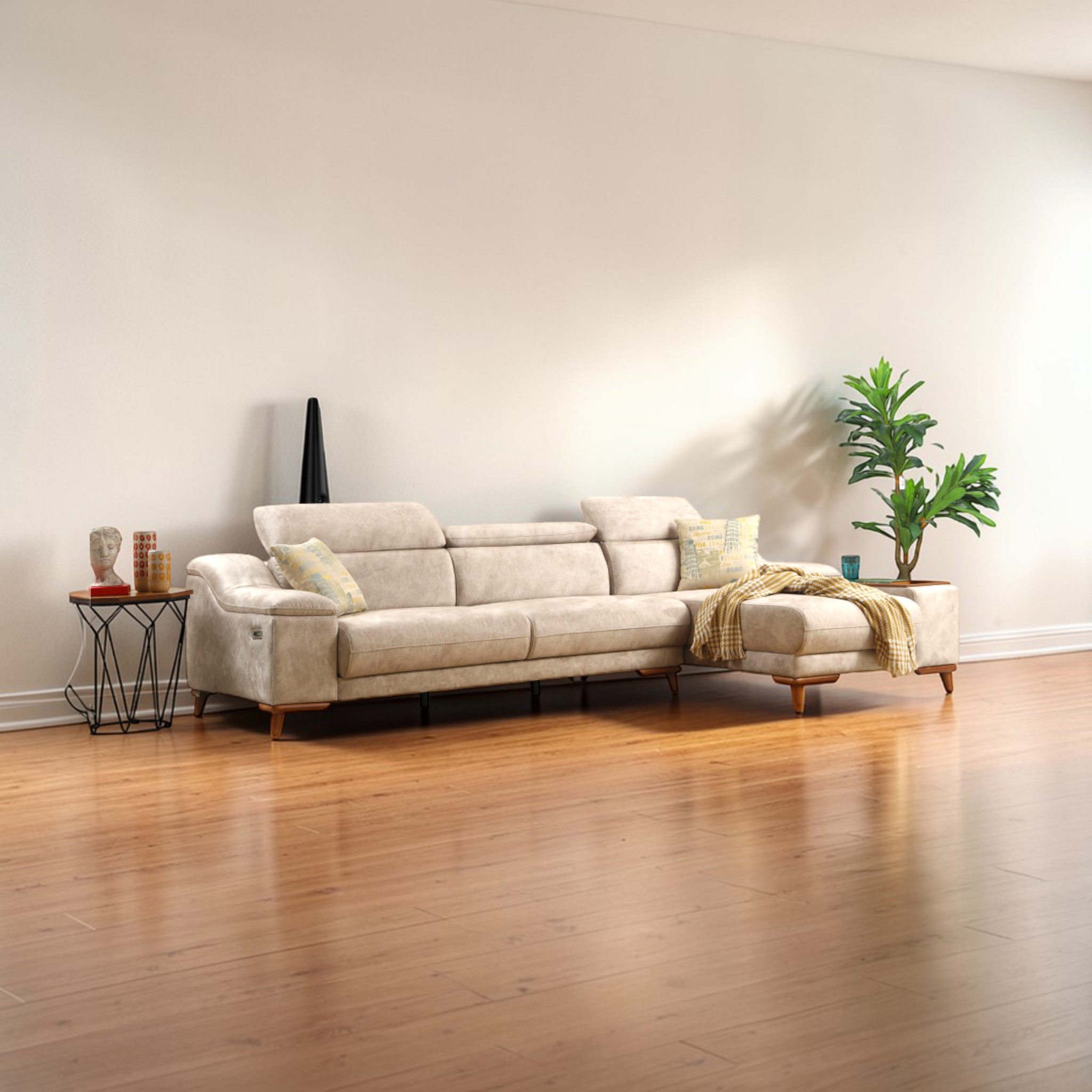 Beige sectional sofa in a living room with wooden floor and white walls