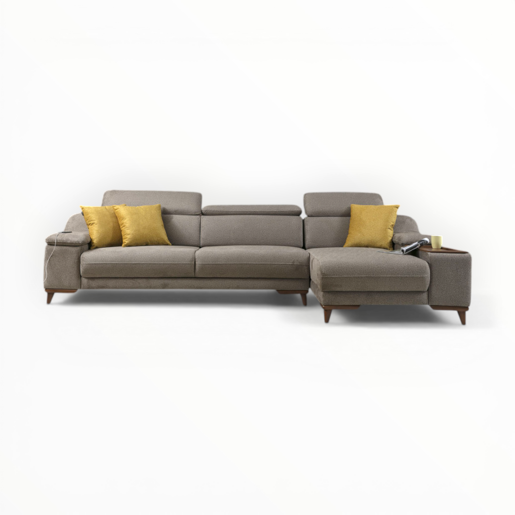 Gray sectional sofa with yellow cushions on a white background