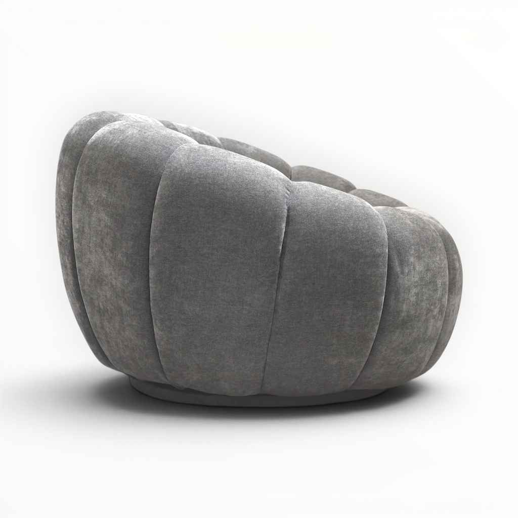 Gray cushioned chair on a white background