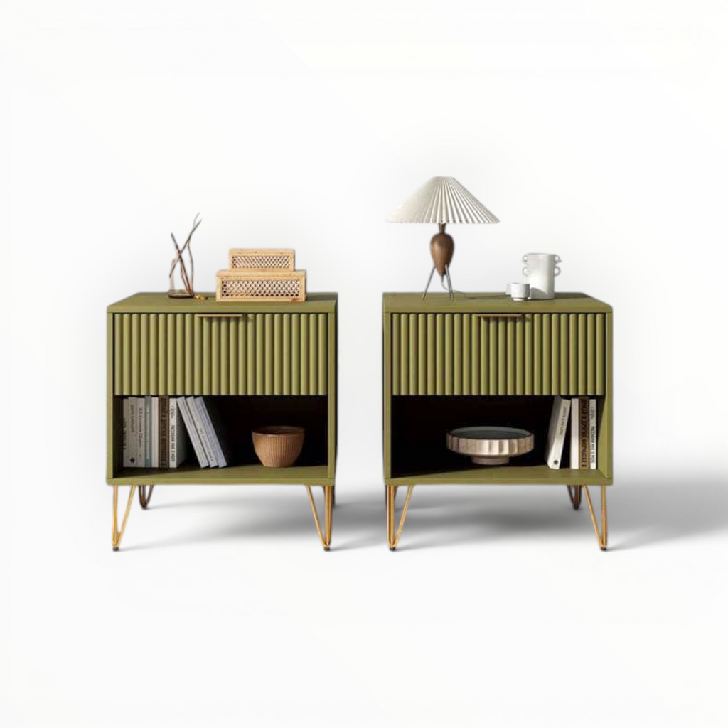 Two green nightstands with decorative items on a white background