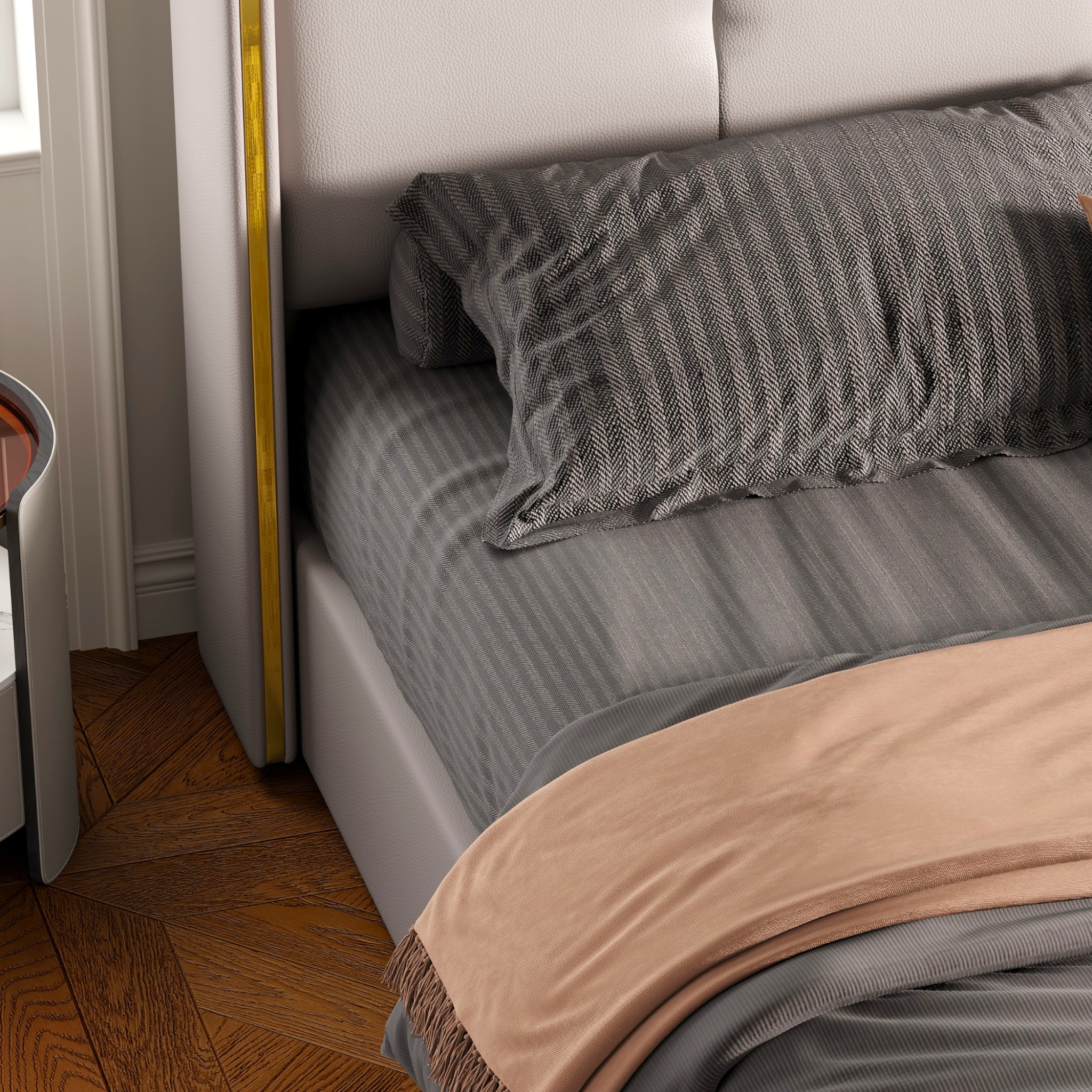 Gray striped bed sheets and pillows on a bed with a wooden floor.
