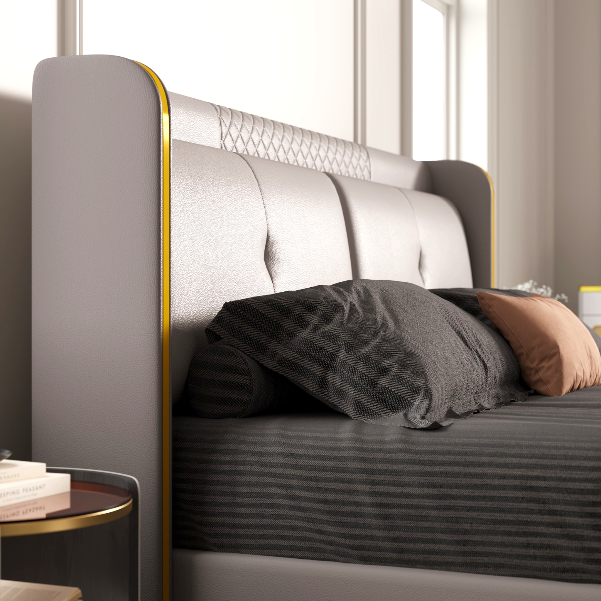 Gray upholstered bed with decorative pillows in a bedroom setting