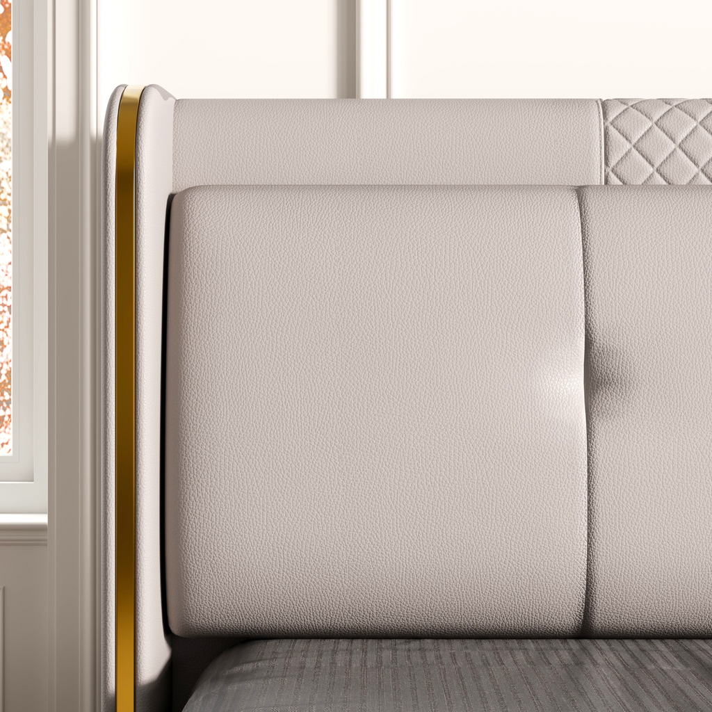 Gray upholstered bed with quilted headboard in a room setting