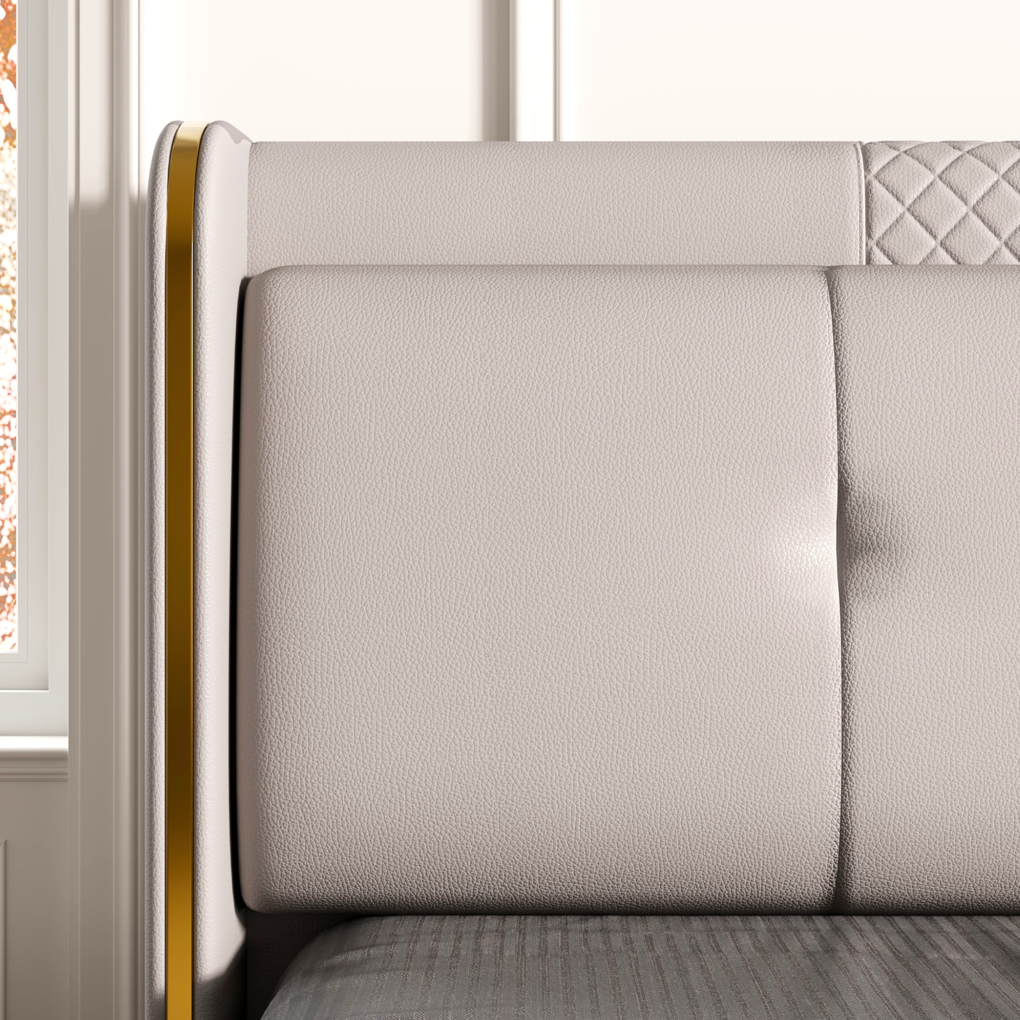 Gray upholstered bed with quilted headboard in a room setting