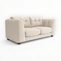 Beige sofa on a white background