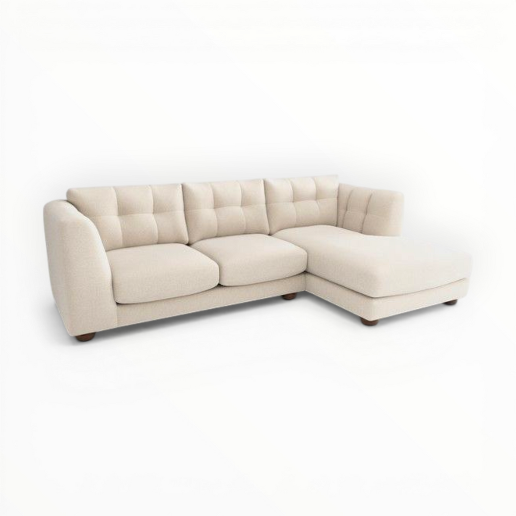 Beige sectional sofa on a white background