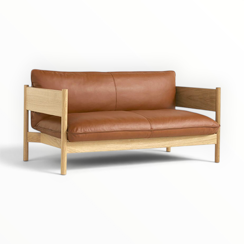 Phantom 2 seater sofa in oak finish with tan leather upholstery — Woodkraft Studio Hyderabad