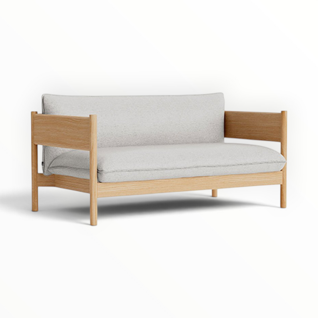Phantom 2 seater sofa in oak finish with white fabric upholstery — Woodkraft Studio Hyderabad