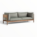 Phantom teakwood sofa in walnut finish with sage green upholstery — Woodkraft Studio Hyderabad