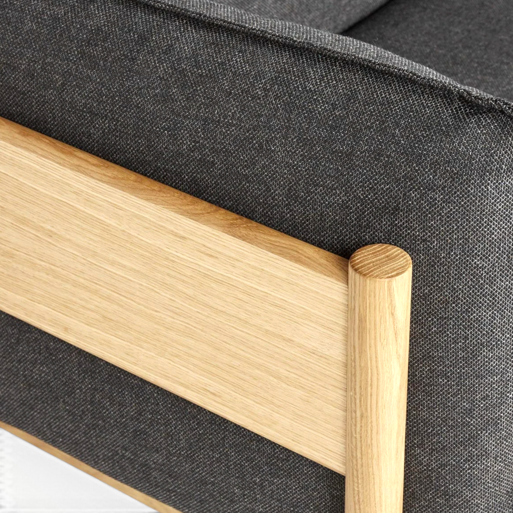 Phantom sofa teakwood corner post and cylindrical leg detail — Woodkraft Studio