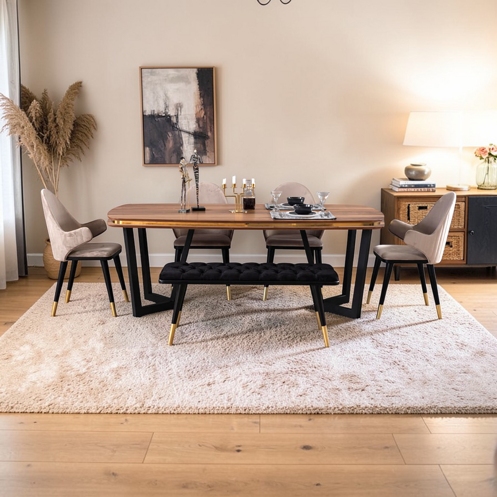 Dining room with a wooden table, chairs, and decor elements.