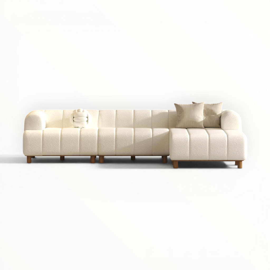 Beige sectional sofa on a white background