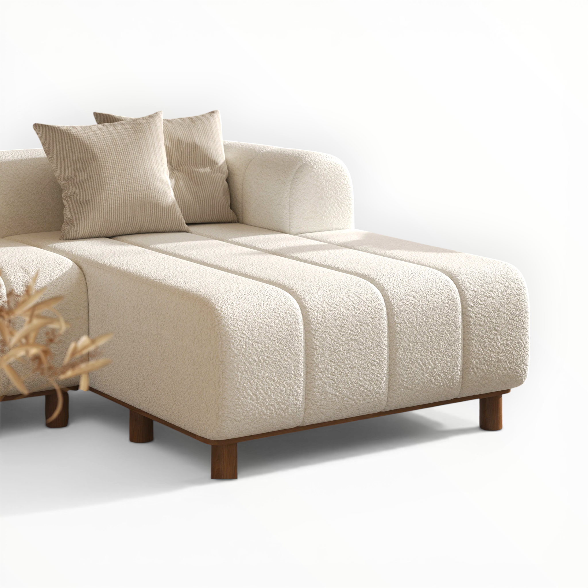Beige sofa with wooden legs on a white background