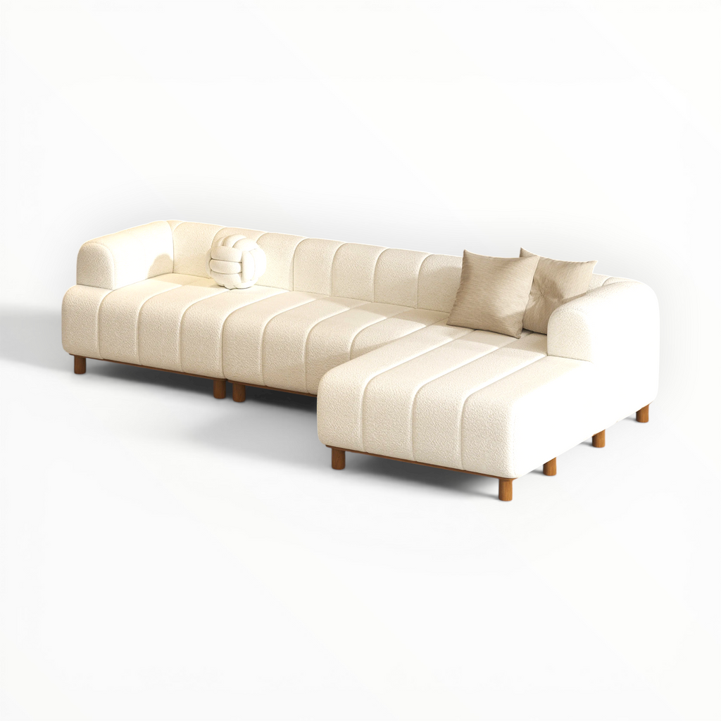 Beige sectional sofa on a white background