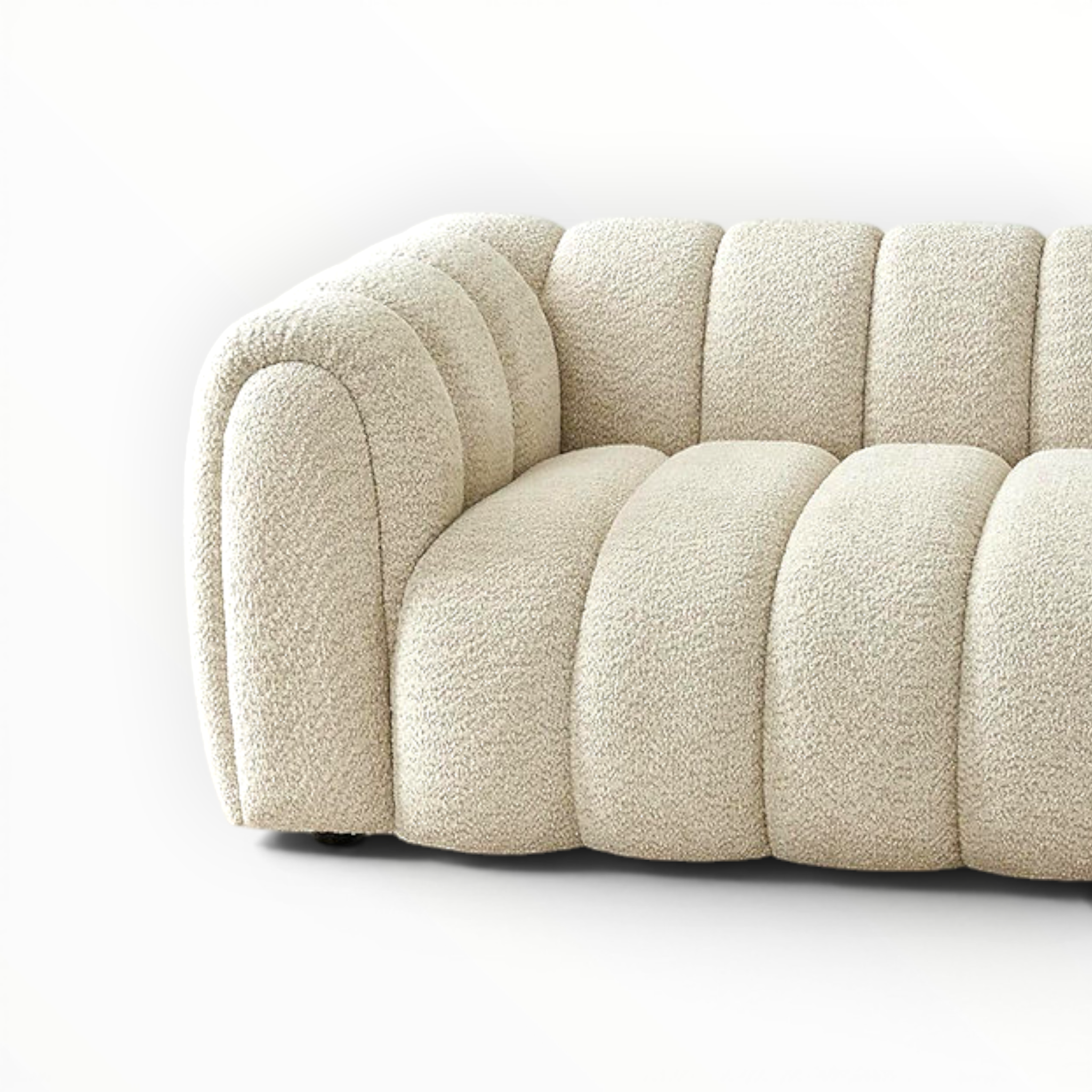 Beige boucle sofa on a white background