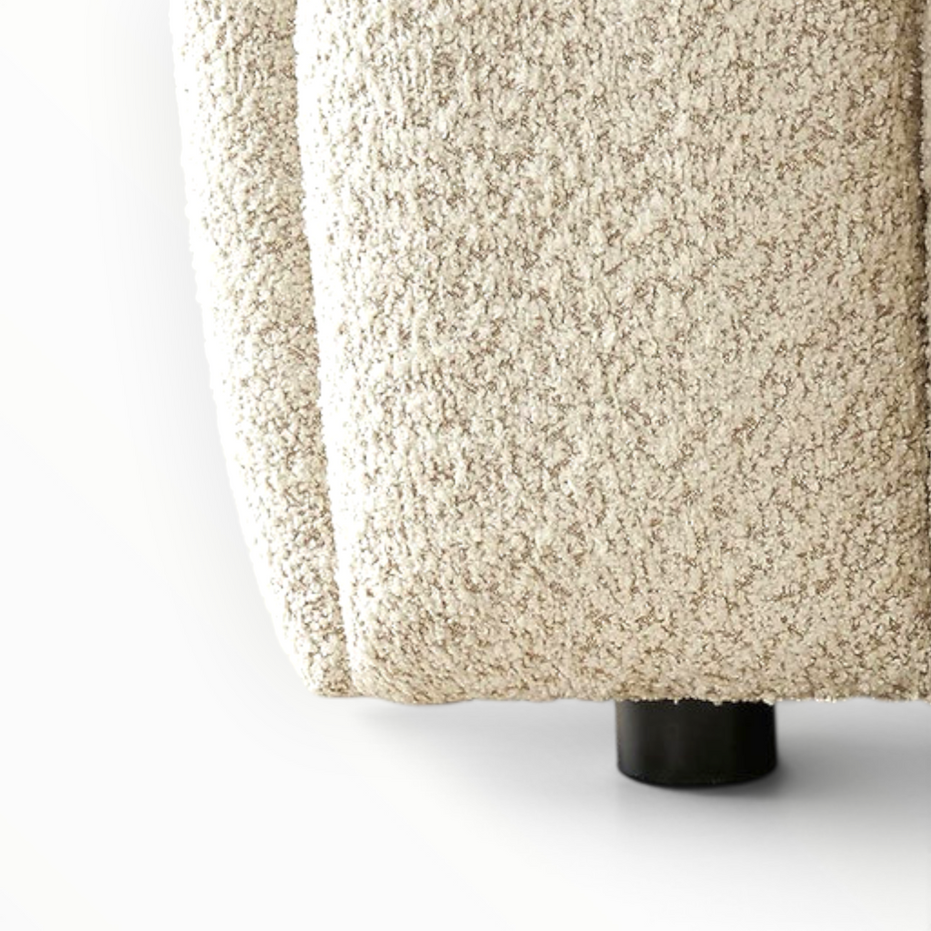 Textured beige fabric on a white background
