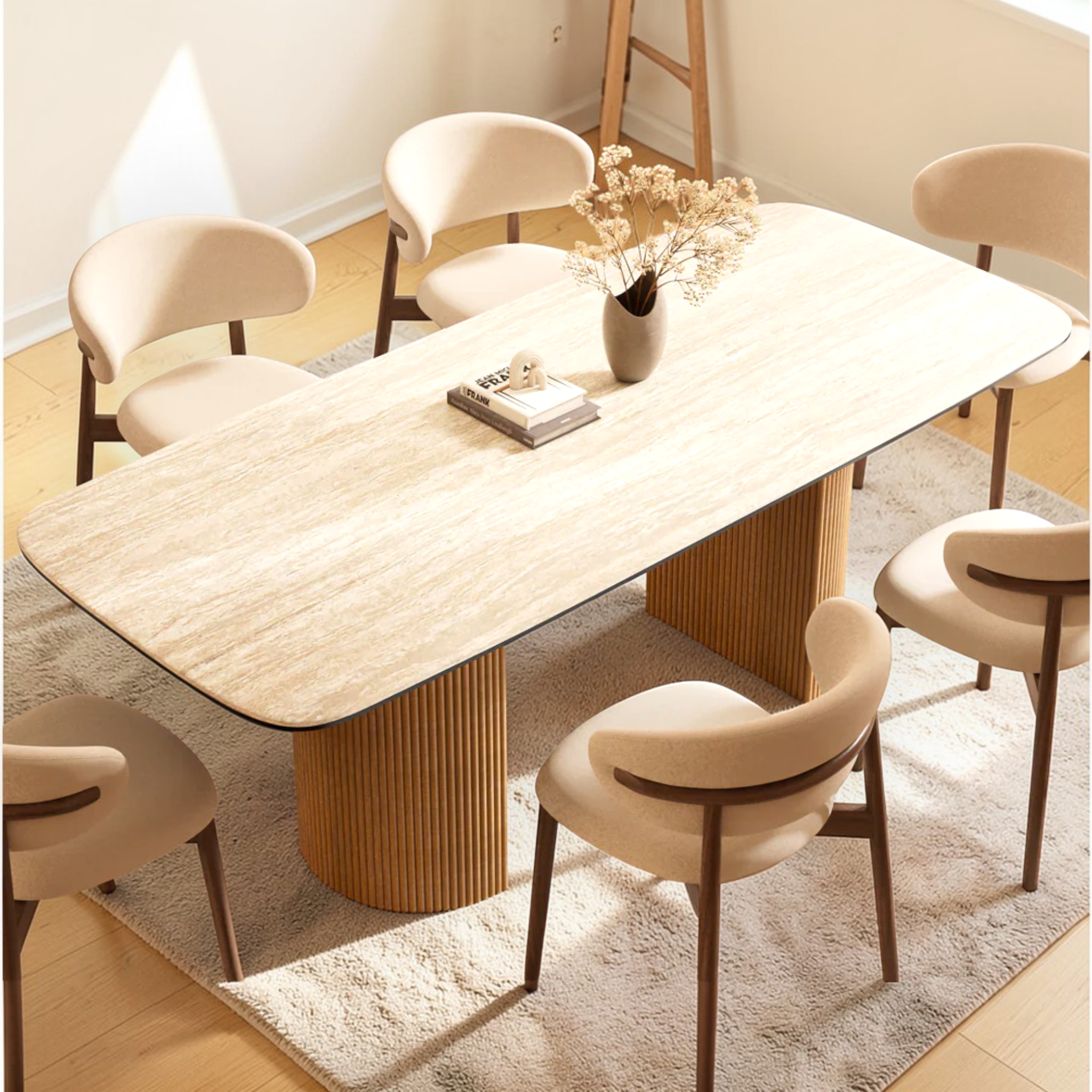 Dining table set with chairs in a well-lit room