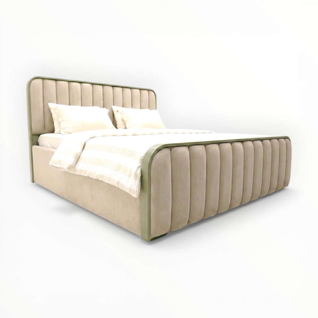 Beige upholstered bed with white bedding on a white background