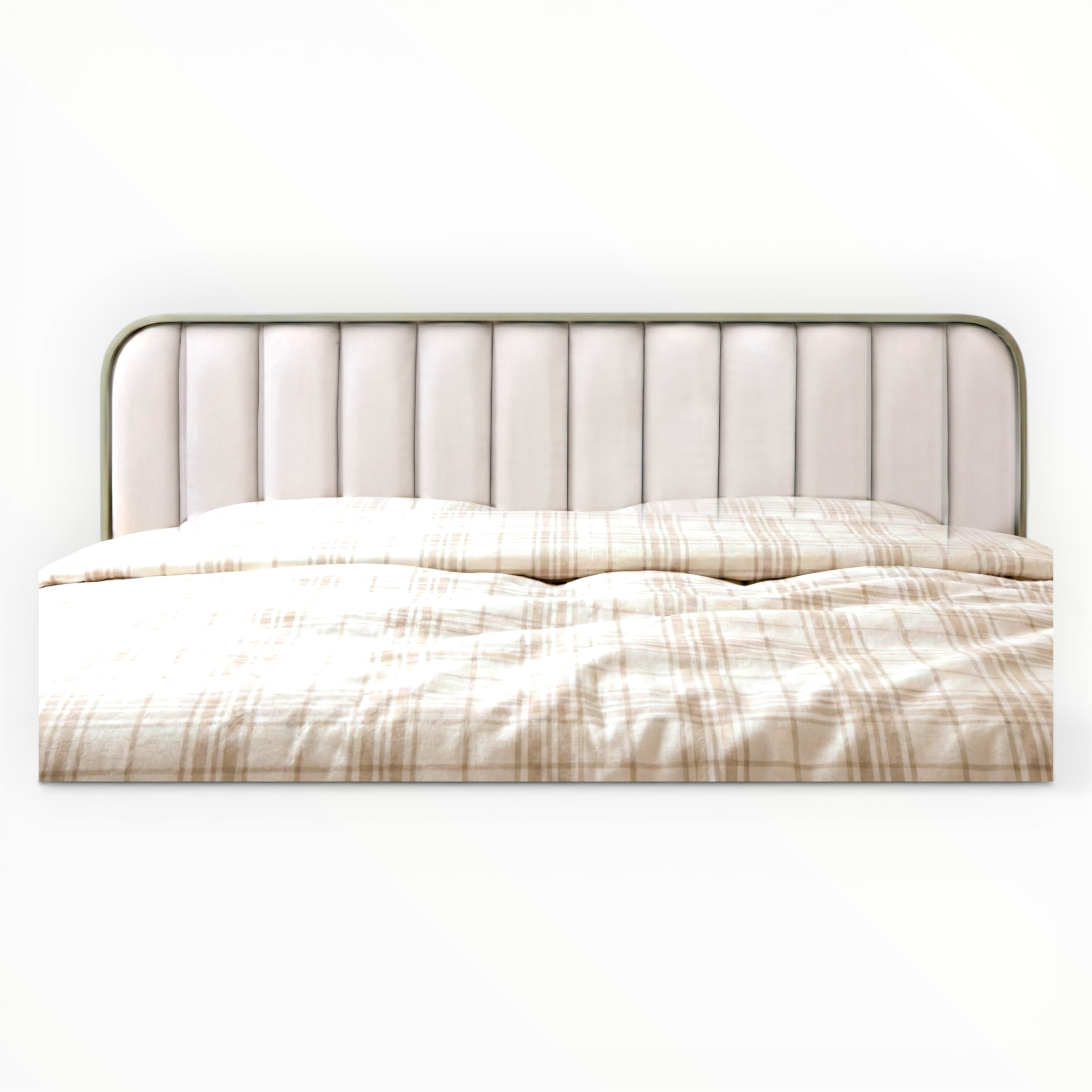 Beige upholstered headboard with plaid bedding on a white background
