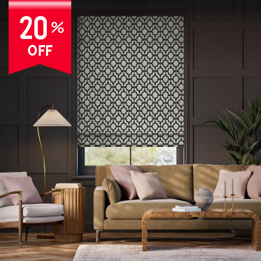 Living room with patterned roller blind and 20% off sale banner.